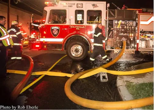 4 Guys apparatus working a fire scene