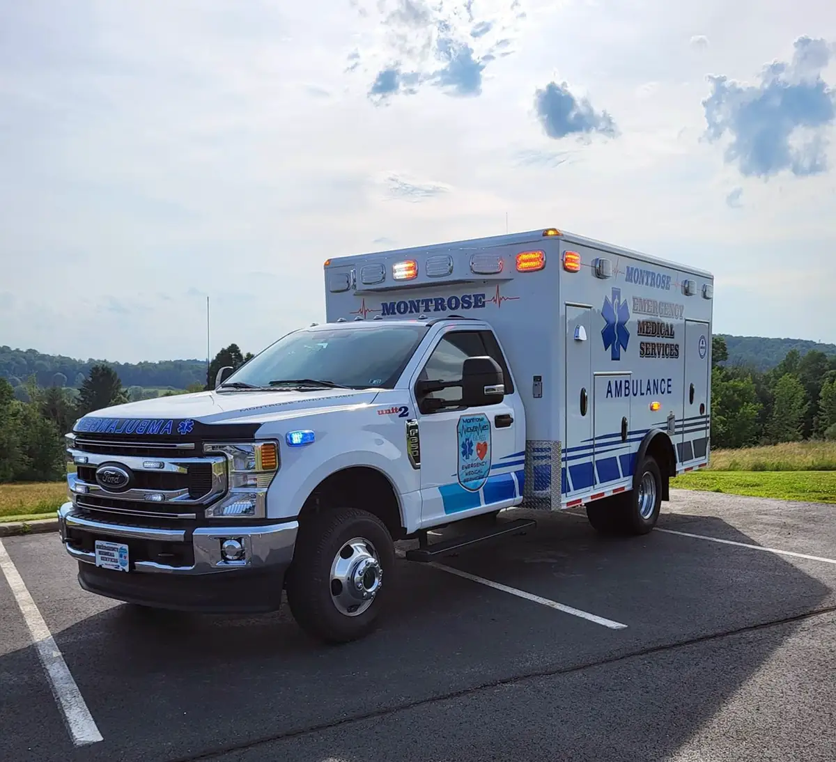 Montrose EMT performing ambulance maintenance